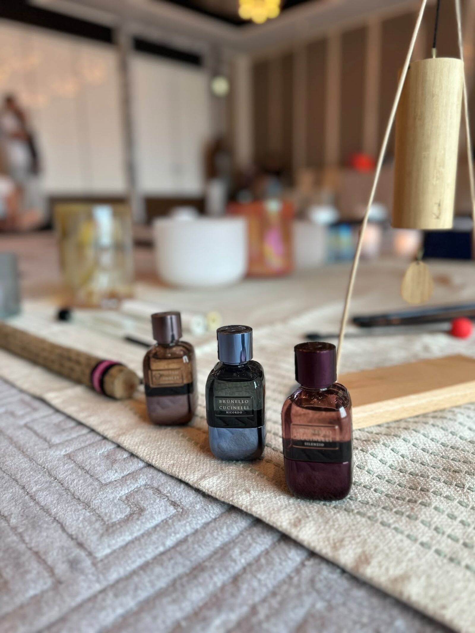 The maison’s fragrances beside the instruments